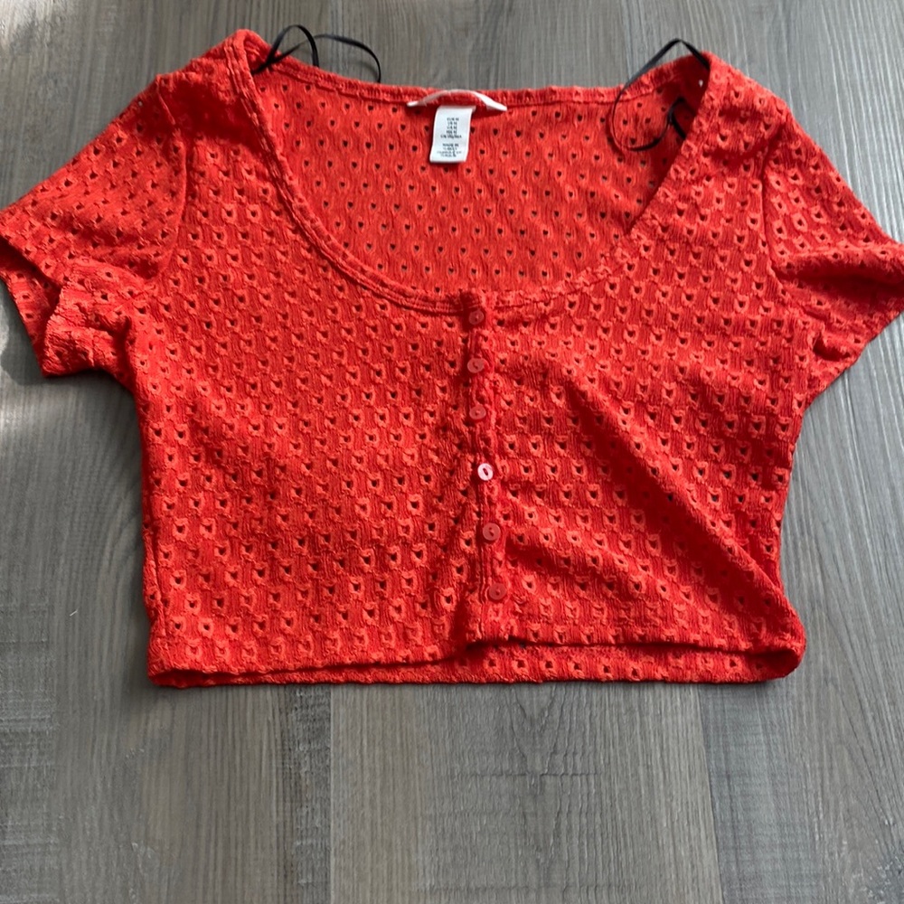 H and M red shirt.